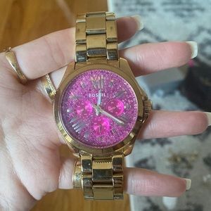 Gold fossil watch with pink face